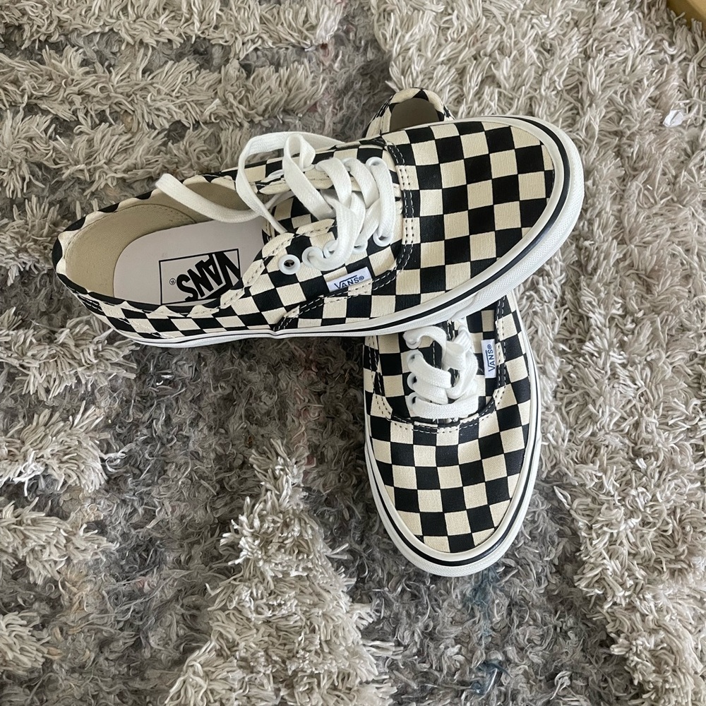 Checkered vans brand new size 6.5 men  size 8 in women . NO BOX